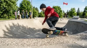 An 8 inch skateboard providing stability for transition and park skating at a Canadian outdoor skatepark.