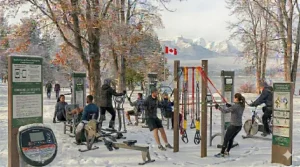 Sleek, modern outdoor gym equipment installed in a high-density urban Toronto neighborhood.