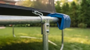 Heavy-duty galvanized steel frame of a trampoline with safety net, engineered to endure Canadian weather conditions.
