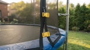 Reinforced zipper entry door on the safety enclosure of a trampoline with safety net.