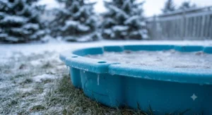 Close-up of a weather-resistant plastic sandbox designed to withstand Canadian winter conditions.